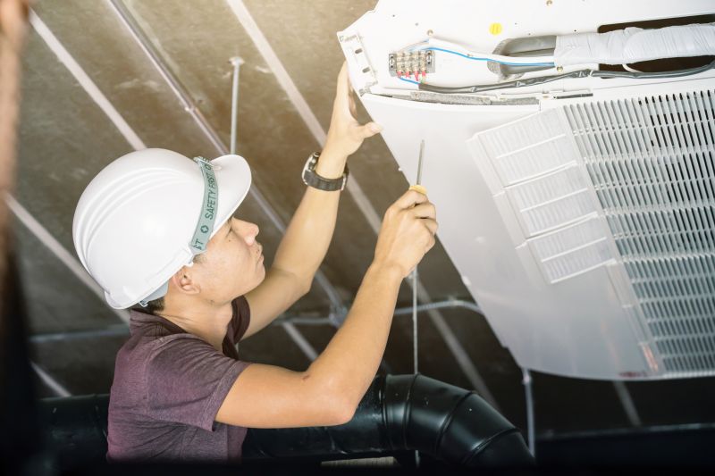 Hvac Repair Technician inspecting system